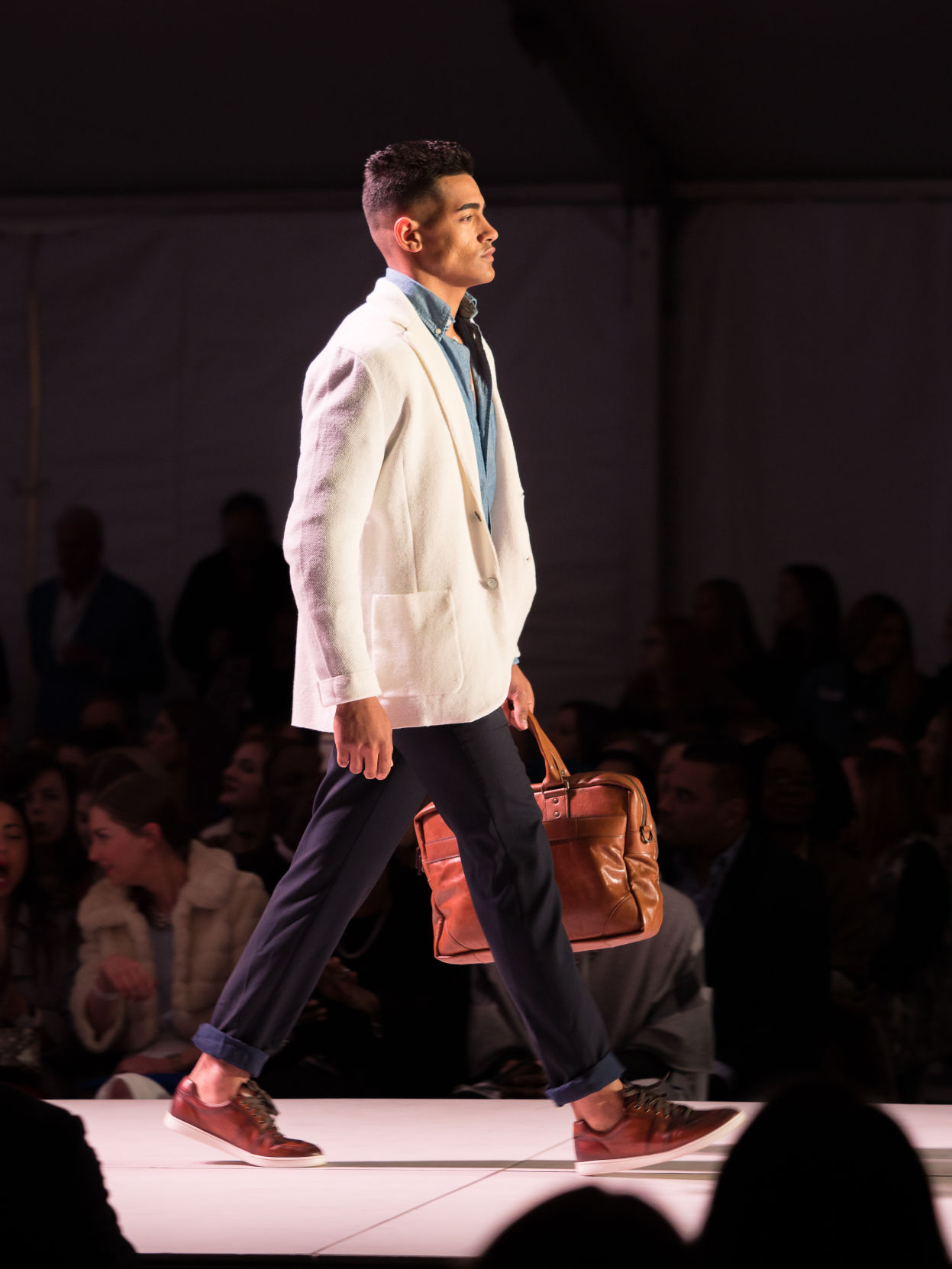 Fashion week dude side profile on runway